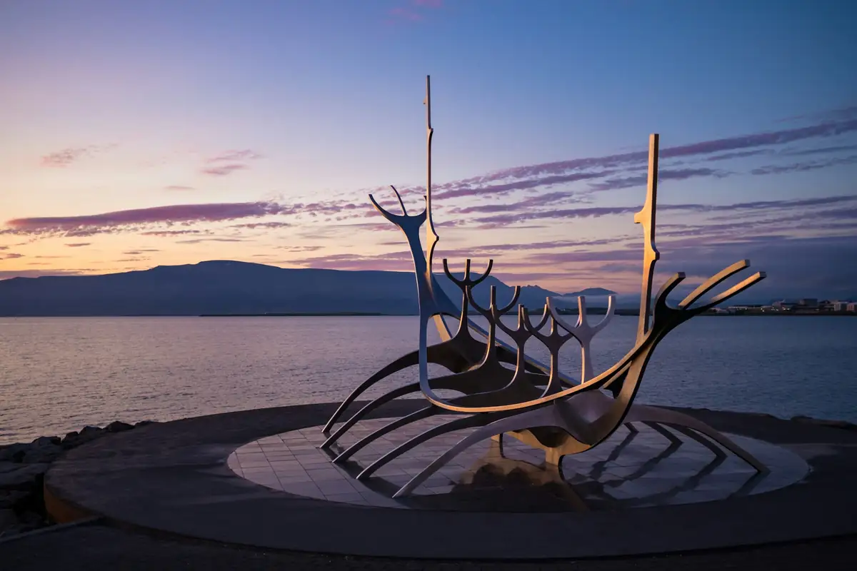 The Sun Voyager sculpture on the Reykjavík shoreline at dusk
