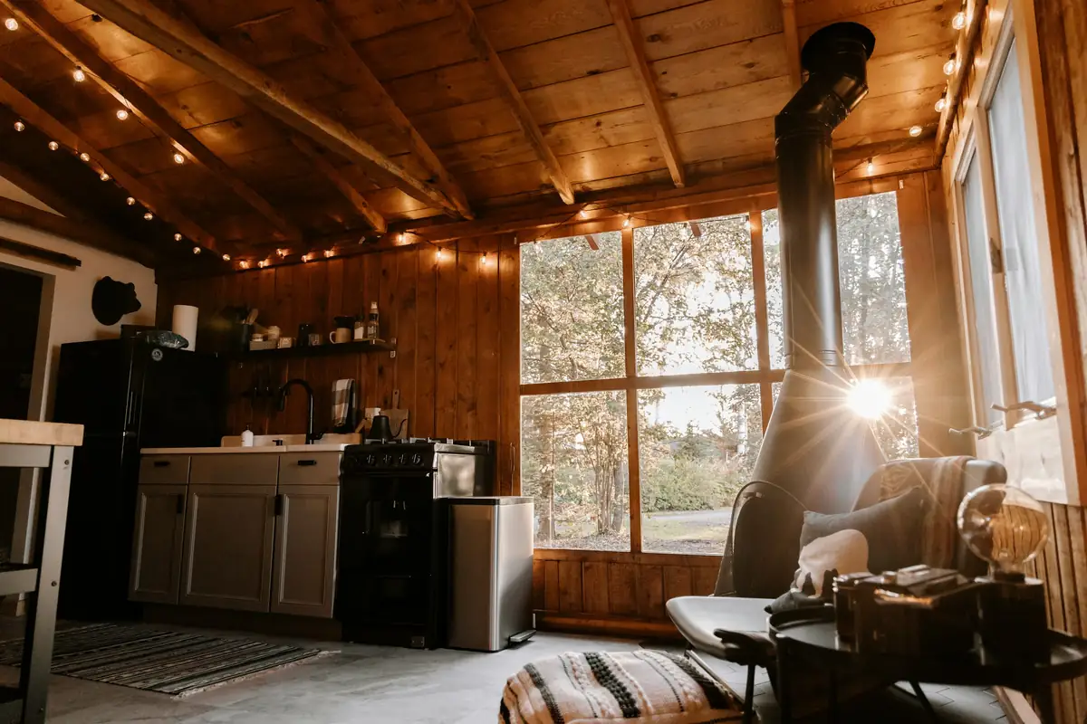The wood stove and the window over the bay